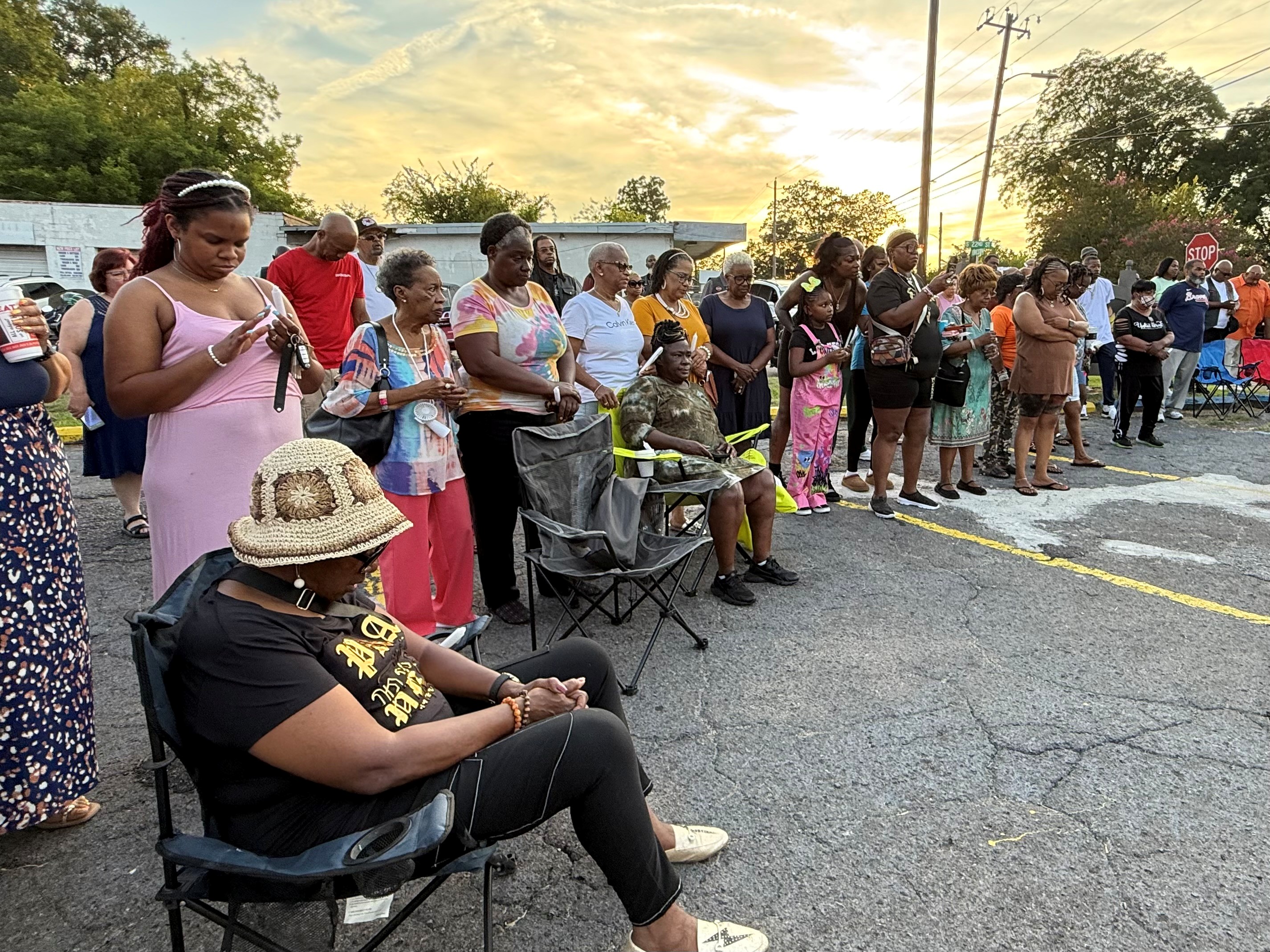 About 100 people gathered Sunday, Aug. 10, 2025, in Gadsden, Ala., to pray for the family of Blessence Pearl, a one-year-old girl whose body was found inside a hearse Saturday.