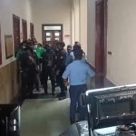 Imponen un año de prisión preventiva a diez acusados por presunto fraude de RD$200 millones al BHD