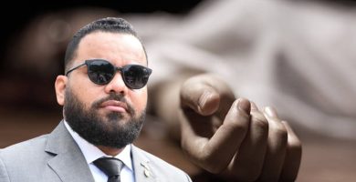 Oficial de la DNCD es hallado con un disparo en la cabeza dentro de su vehículo